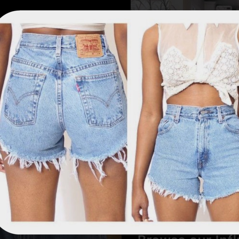 Vintage Levi’s white tab distressed jean shorts